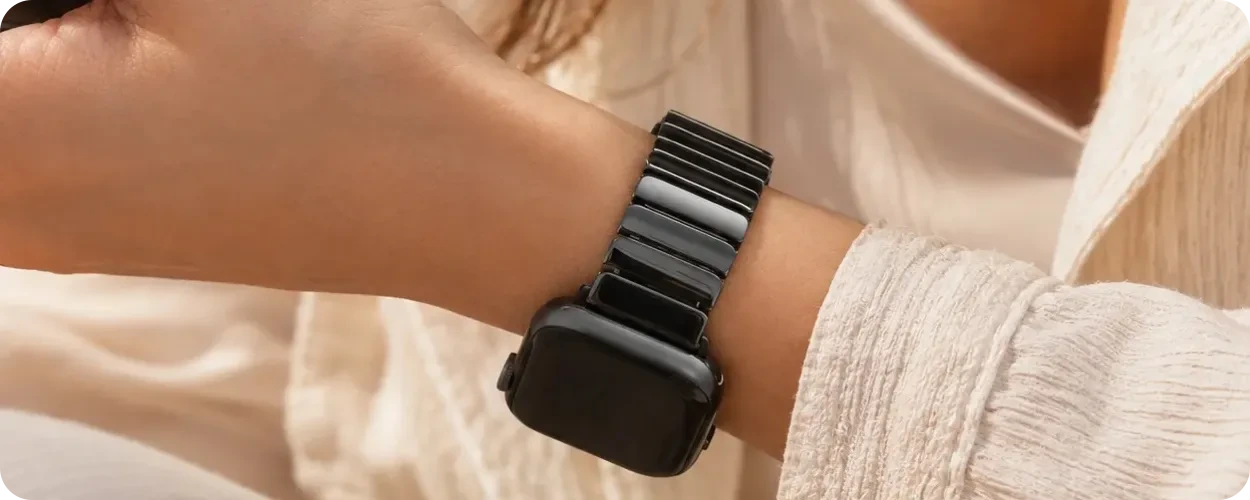 Black ceramic Apple Watch band fitted comfortably on the wrist