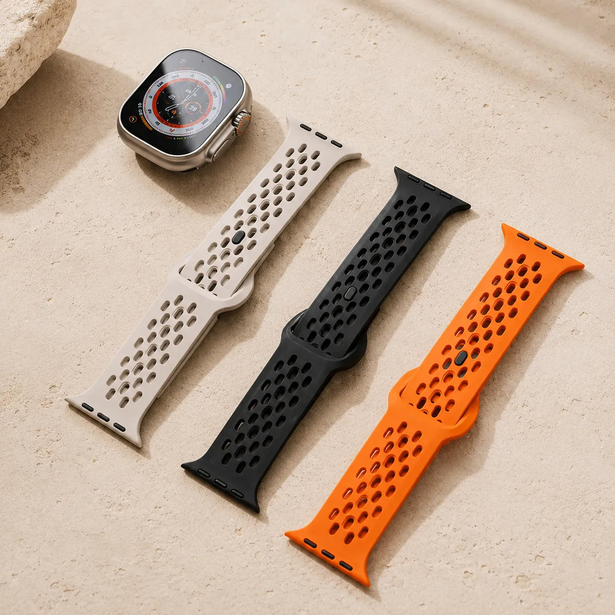 Orange, black and starlight breathable FKM Apple Watch bands