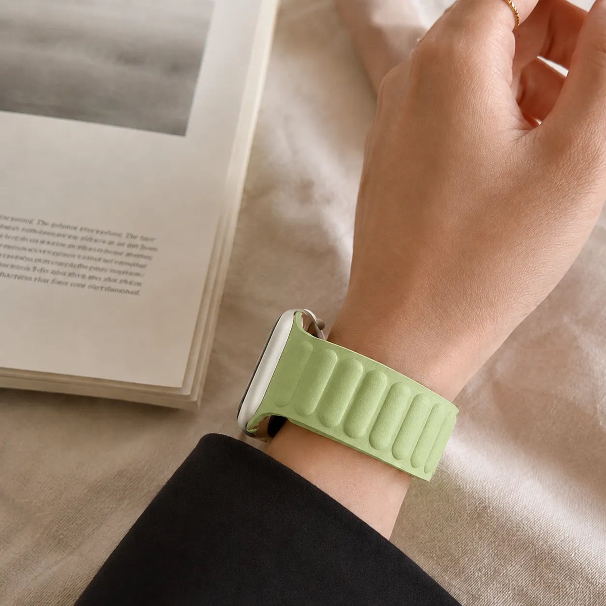 Mint green magnetic leather link Apple Watch band styled for everyday wear