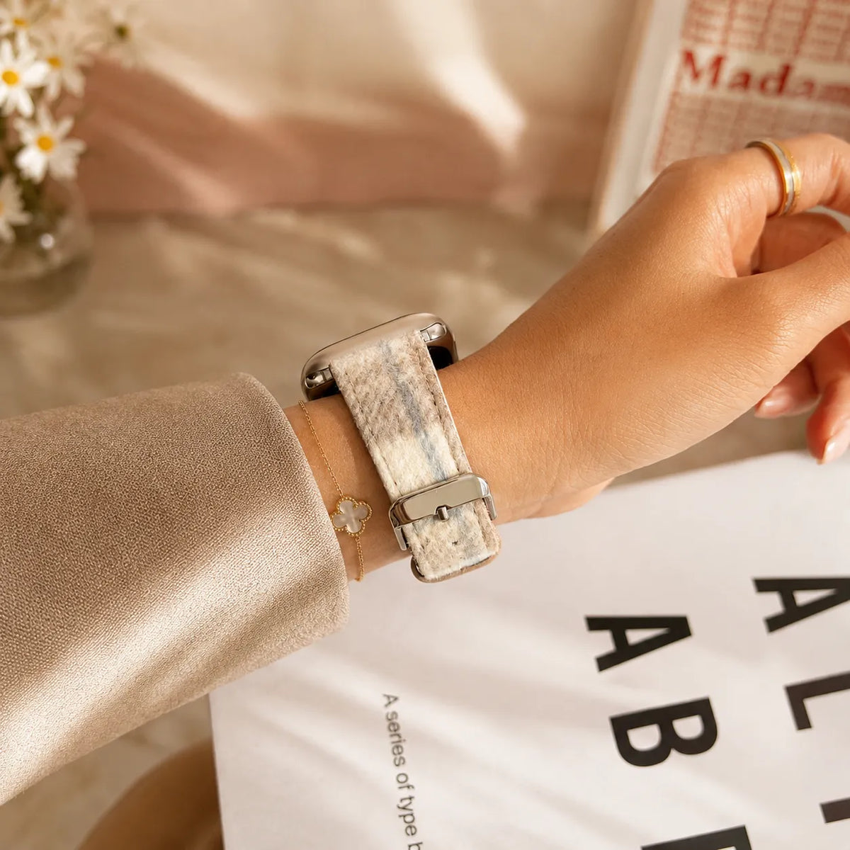 Close view of the soft lambswool tartan texture and pin buckle